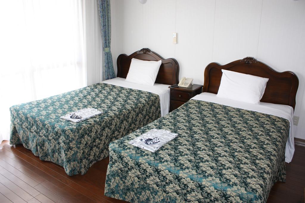 Morimar Resort Hotel Yomitan Ruang foto